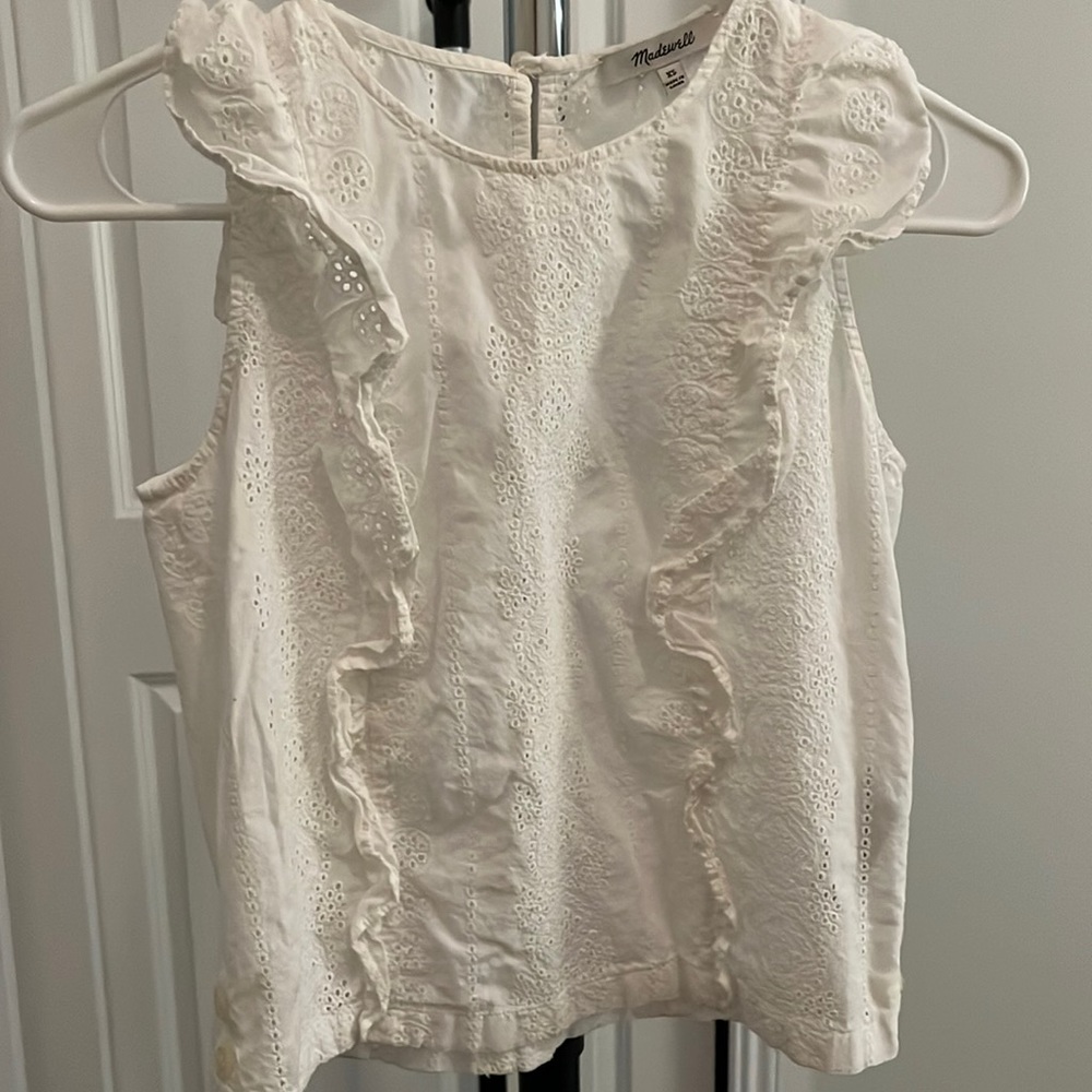 Madewell eyelet tank. Boxy fit, right at waist.